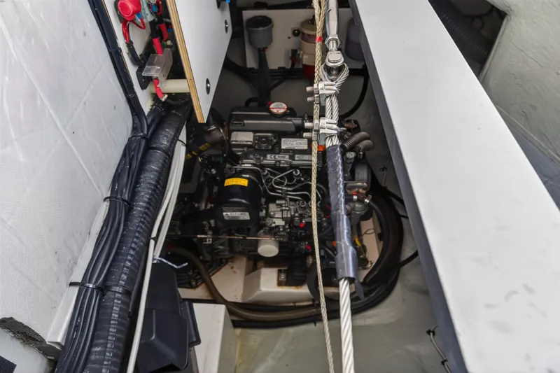 Changing Keys Yacht Photos Pics Engine compartment of a 2020 Leopard 40 catamaran, showcasing detailed wiring and components.