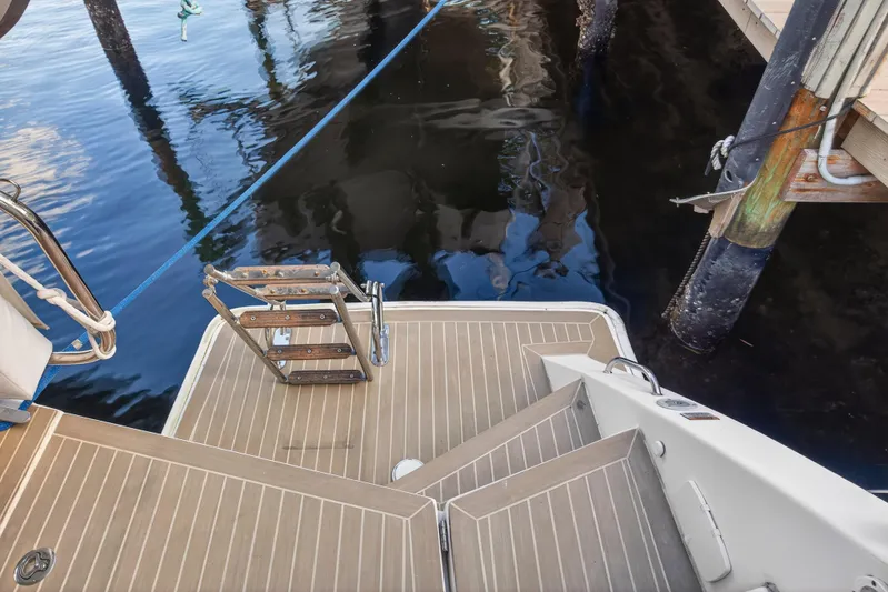 Changing Keys Yacht Photos Pics Stern view of 2020 Leopard 40 catamaran with swim ladder and dock.