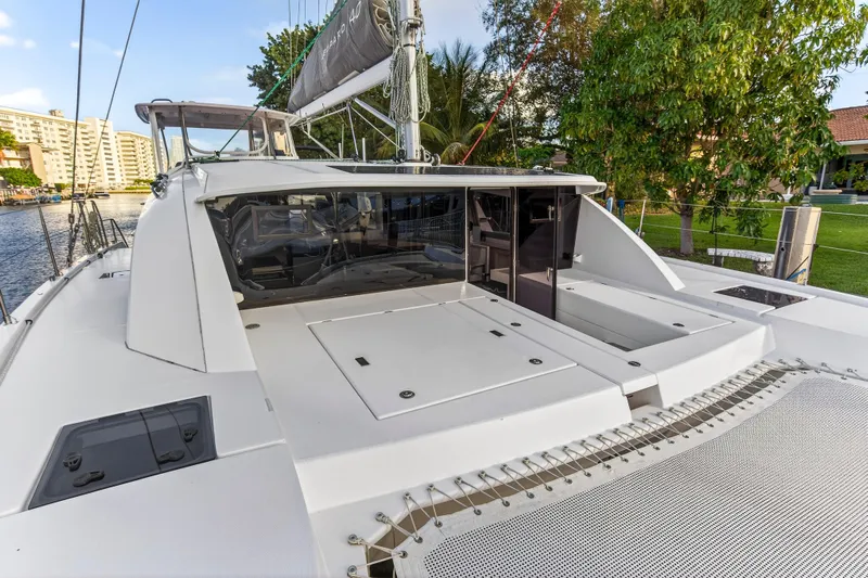 Changing Keys Yacht Photos Pics 2020 Leopard 40 catamaran docked, featuring spacious deck and modern design.