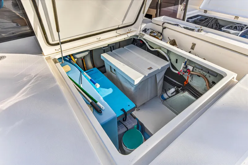 Changing Keys Yacht Photos Pics Open storage compartment on a 2020 Leopard 40 catamaran, featuring organized equipment and supplies.