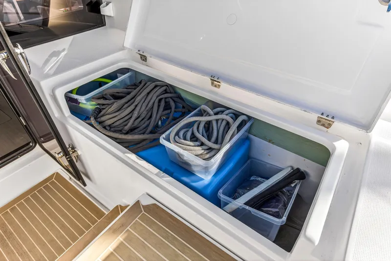 Changing Keys Yacht Photos Pics Storage compartment on 2020 Leopard 40 boat with ropes and equipment.