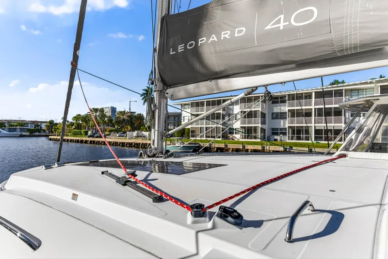 Changing Keys Yacht Photos Pics 2020 Leopard 40 catamaran docked, showcasing deck and sail details.