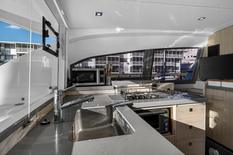 Changing Keys Yacht Photos Pics Modern kitchen interior of 2020 Leopard 40 yacht with sleek appliances and ample counter space.