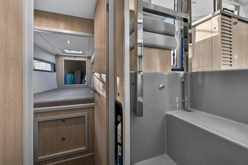 Changing Keys Yacht Photos Pics Interior of 2020 Leopard 40 catamaran, featuring modern cabin and sleek wooden finishes.