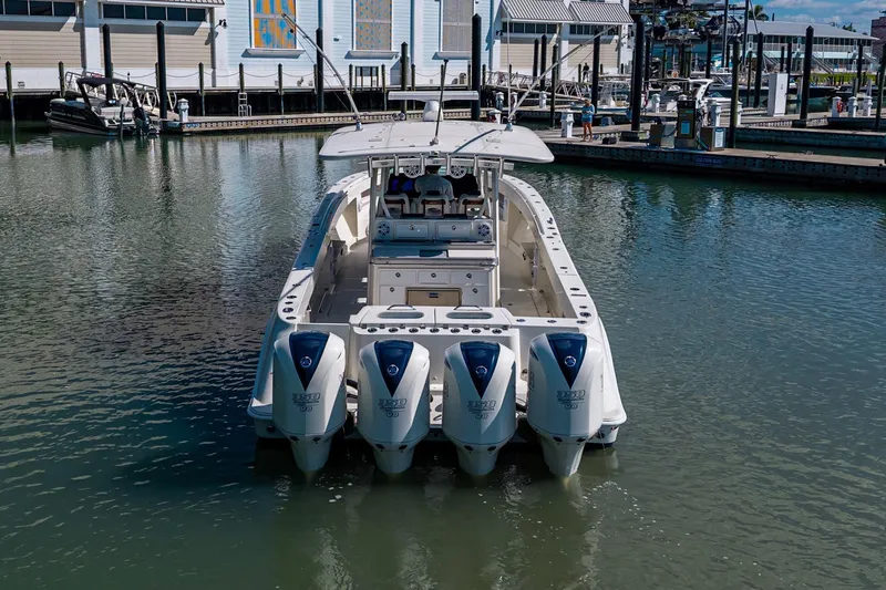  Yacht Photos Pics 2018 HCB 42 Siesta boat with four engines docked in marina.