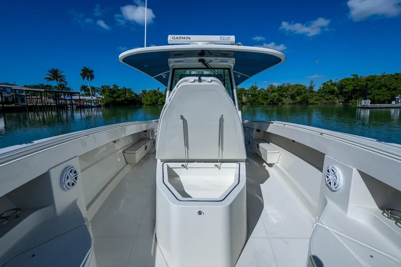  Yacht Photos Pics 2018 HCB 42 Siesta boat interior with open deck, clear sky, and waterfront view.
