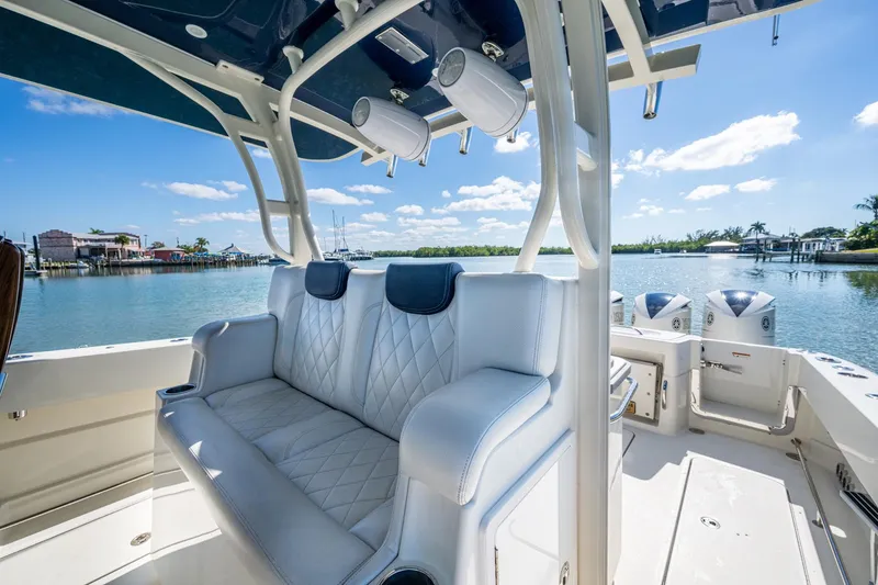  Yacht Photos Pics 2018 HCB 42 Siesta boat interior with luxurious seating, overlooking serene waterfront.