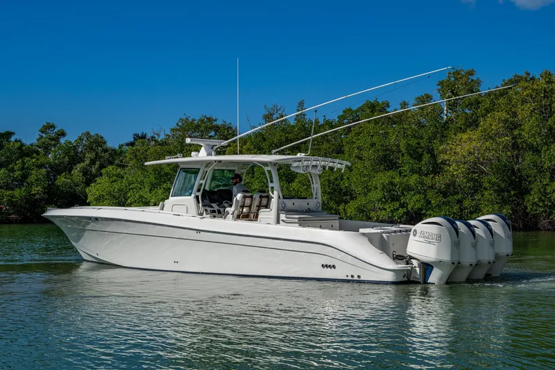  Yacht Photos Pics 2018 HCB 42 Siesta boat with Yamaha engines on a calm waterway.