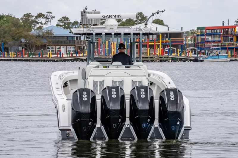  Yacht Photos Pics 2022 Invincible 39 Open Fisherman boat with four powerful engines on the water.