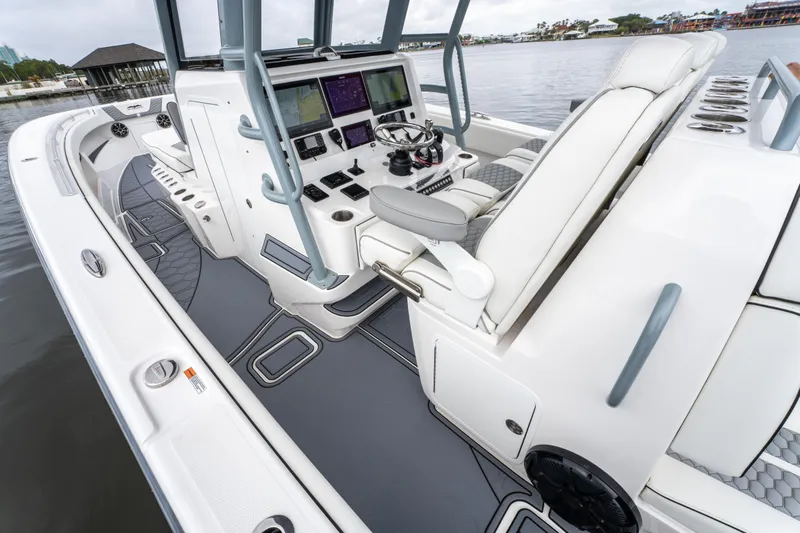  Yacht Photos Pics 2022 Invincible 39 Open Fisherman boat interior with advanced navigation controls.
