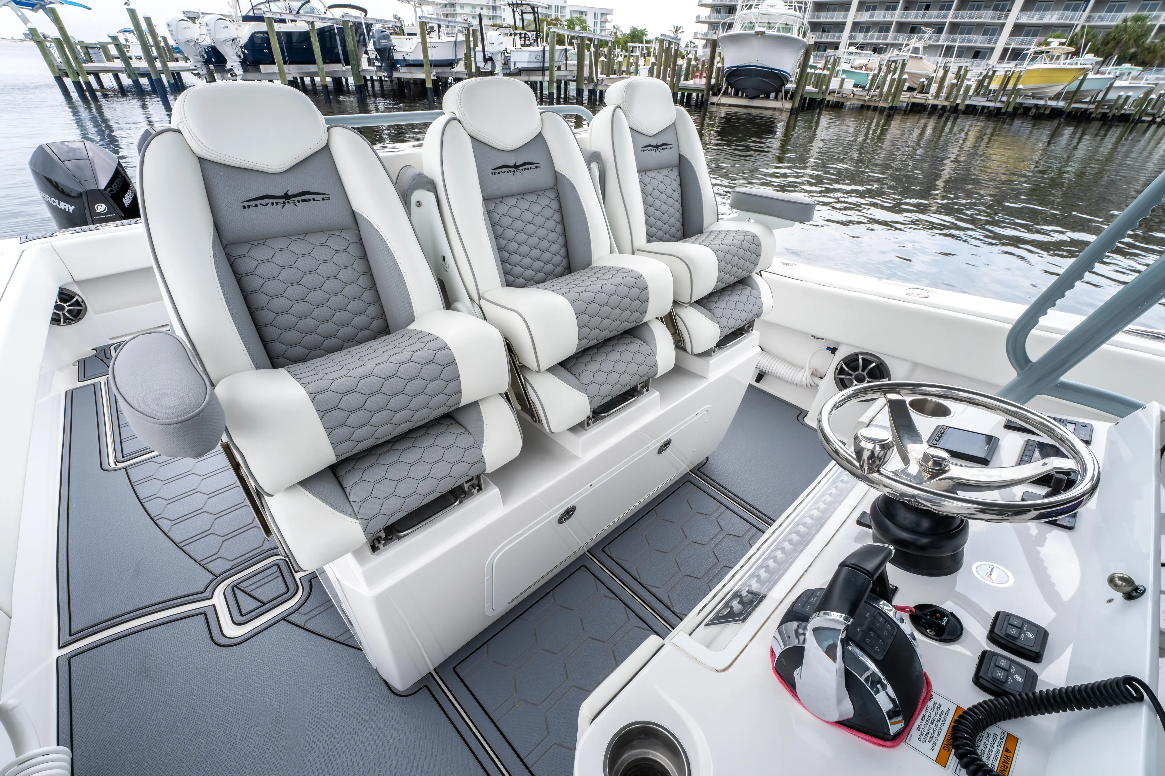  Yacht Photos Pics 2022 Invincible 39 Open Fisherman boat interior with luxurious seating and modern controls.