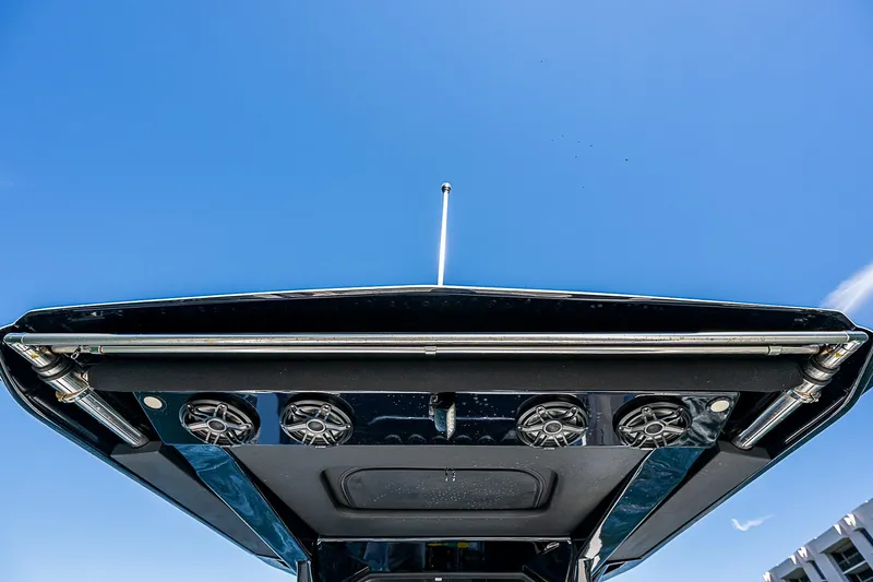  Yacht Photos Pics 2023 Nor-Tech 400 boat roof with speakers against clear blue sky.