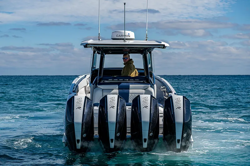  Yacht Photos Pics 2023 Nor-Tech 400 boat with multiple engines cruising on open water.