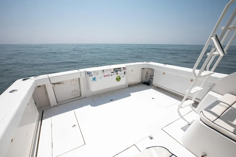  Yacht Photos Pics Jupiter 35 Flybridge 2003 boat deck overlooking the ocean.