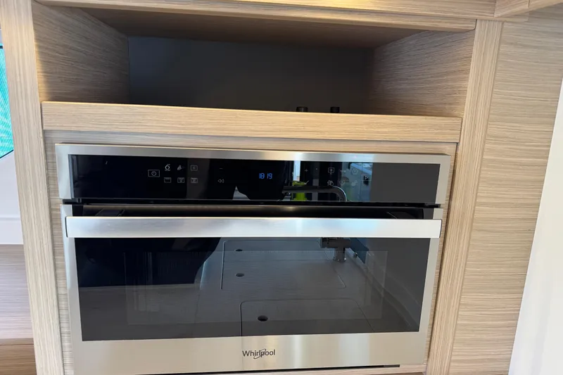  Yacht Photos Pics Modern Whirlpool oven in a 2026 Lagoon 55 yacht kitchen.