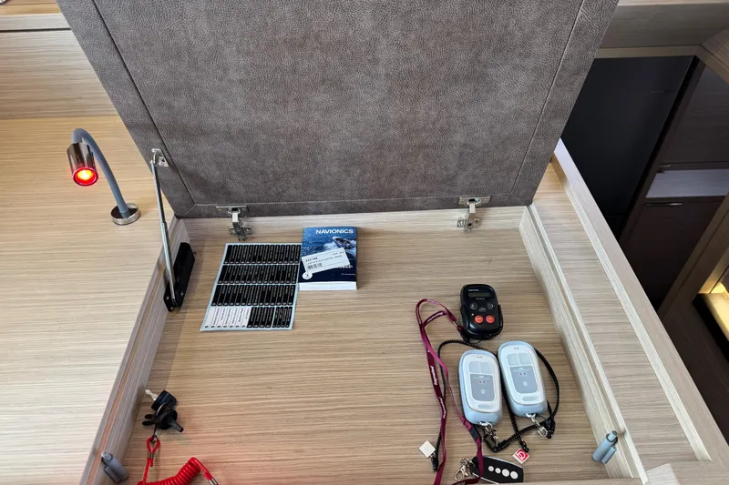  Yacht Photos Pics Interior of 2026 Lagoon 55 yacht with navigation tools and controls.