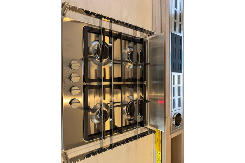  Yacht Photos Pics Modern stainless steel gas stove in Lagoon 55 yacht kitchen, 2026 model.