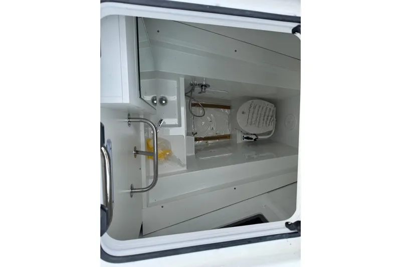  Yacht Photos Pics Interior view of 2026 Lagoon 55 yacht bathroom with modern fixtures.