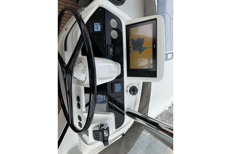  Yacht Photos Pics Helm of 2026 Lagoon 55 yacht with navigation display and controls.