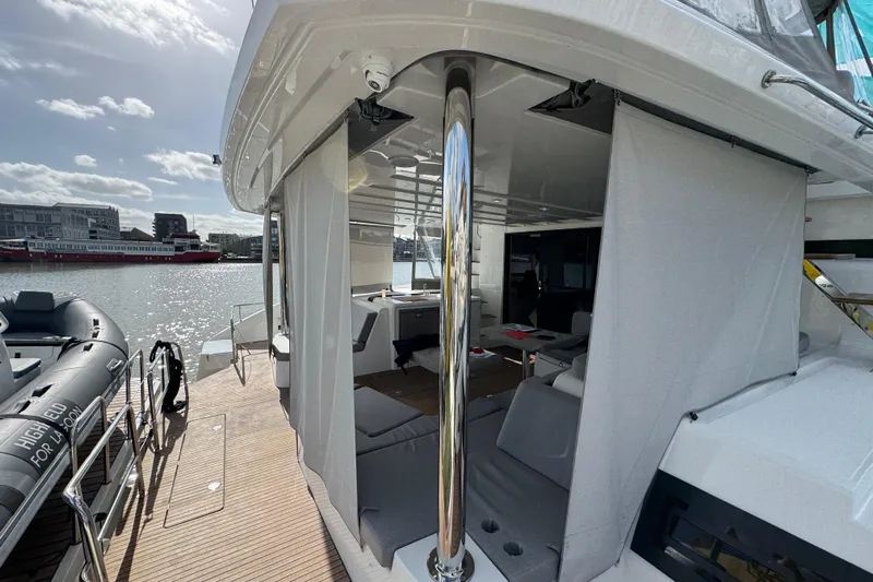  Yacht Photos Pics Luxurious 2026 Lagoon 55 yacht interior with modern design and waterfront view.