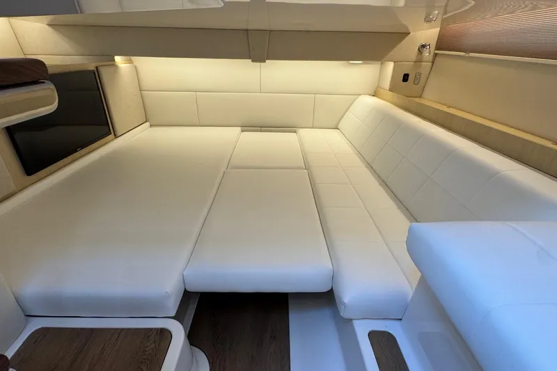 36 Xo Yacht Photos Pics Luxurious interior of 2026 Regal 36 XO yacht with white leather seating.