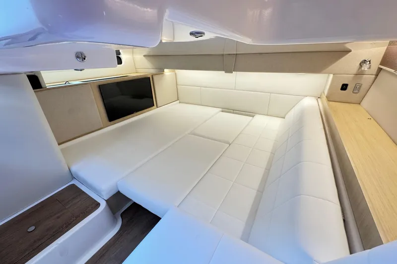 36 Xo Yacht Photos Pics Luxurious interior of 2026 Regal 36 XO yacht with white seating and modern design.