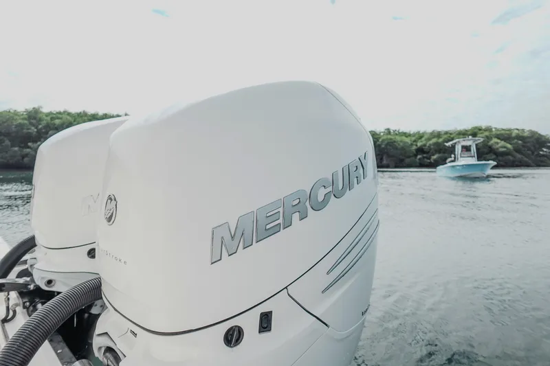  Yacht Photos Pics Twin Mercury outboard engines on a 2007 Boston Whaler 305 Conquest in scenic waters.