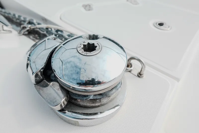  Yacht Photos Pics Close-up of a 2007 Boston Whaler 305 Conquest boat's anchor winch mechanism.