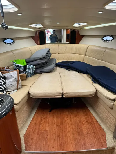  Yacht Photos Pics Interior of 2008 Formula 400 Super Sport boat with beige seating and wooden flooring.