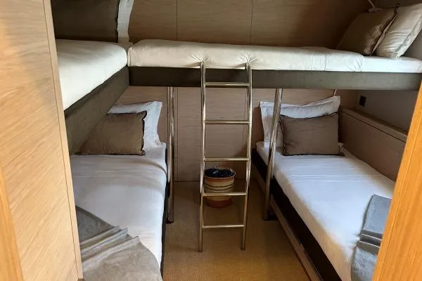 Maty Yacht Photos Pics 2023 Lagoon Seventy 7 yacht cabin with bunk beds and cozy interior.