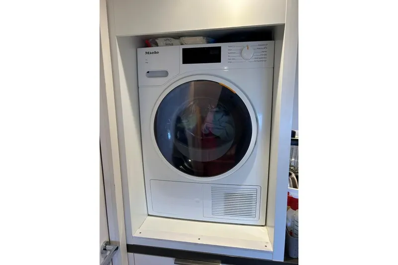 Maty Yacht Photos Pics Miele washing machine in a compact laundry space on a 2023 Lagoon Seventy 7 yacht.