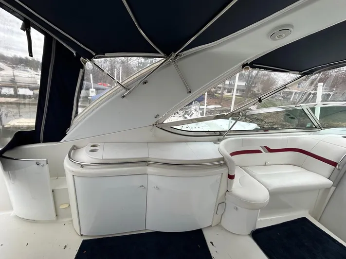 Current Asset Yacht Photos Pics 2001 Formula 400 Super Sport yacht interior with seating and cabinetry.
