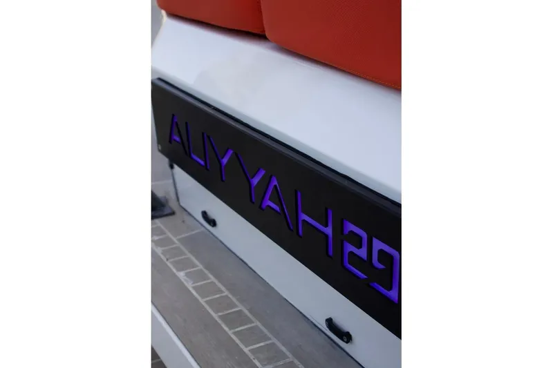  Yacht Photos Pics 2018 Vanquish Yachts VQ 45 with illuminated nameplate and orange seating.