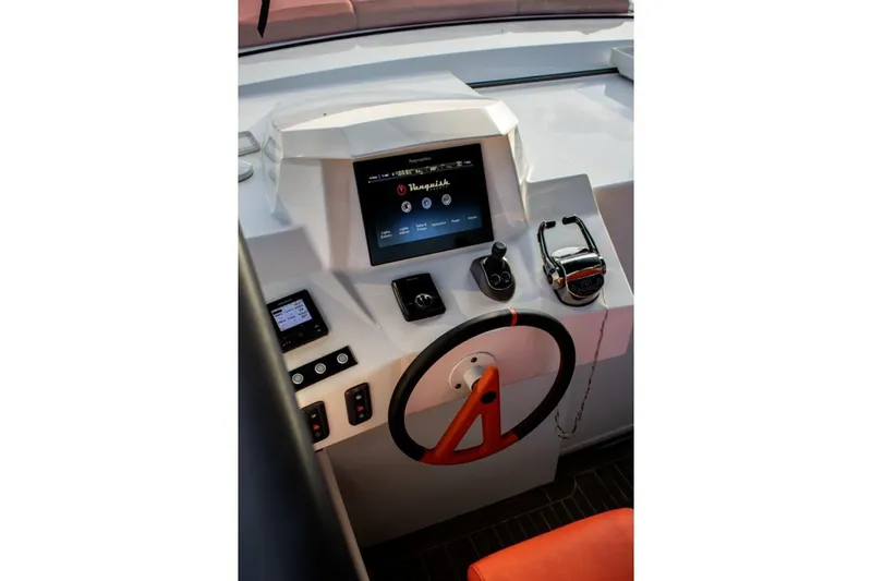  Yacht Photos Pics Cockpit of 2018 Vanquish Yachts VQ 45 with modern controls and display.