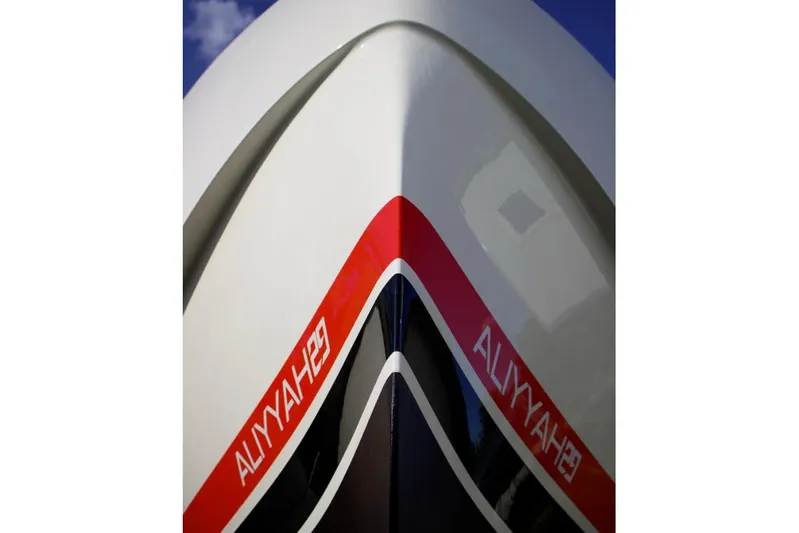  Yacht Photos Pics Bow view of 2018 Vanquish Yachts VQ 45 with red and white design.