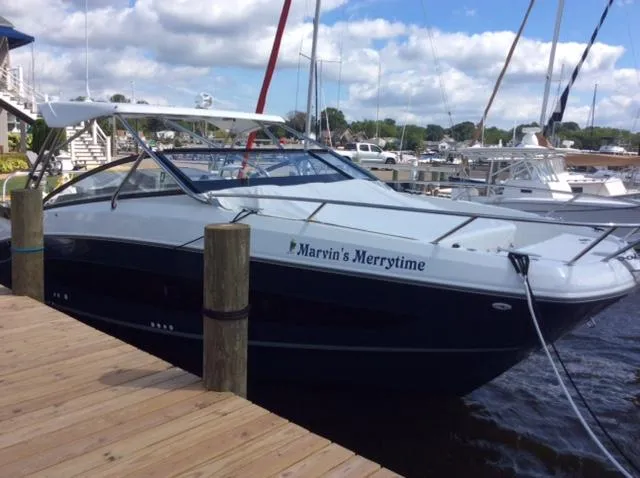  Yacht Photos Pics 2023 Beneteau Flyer 10 docked at marina under cloudy sky.