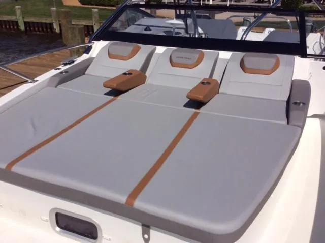  Yacht Photos Pics 2023 Beneteau Flyer 10 boat with spacious sunbathing deck and comfortable seating.