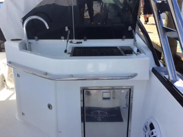  Yacht Photos Pics 2023 Beneteau Flyer 10 boat kitchen area with sink and grill.