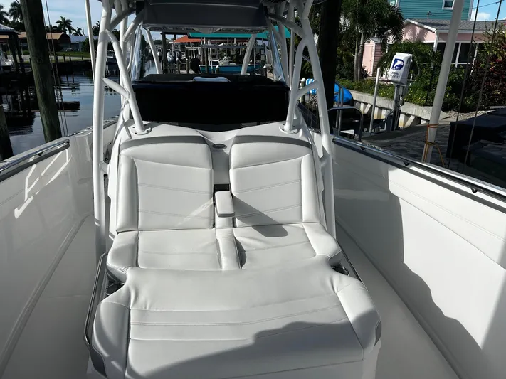  Yacht Photos Pics 2021 Nor-Tech 390 Sport Center Console boat with white seating.