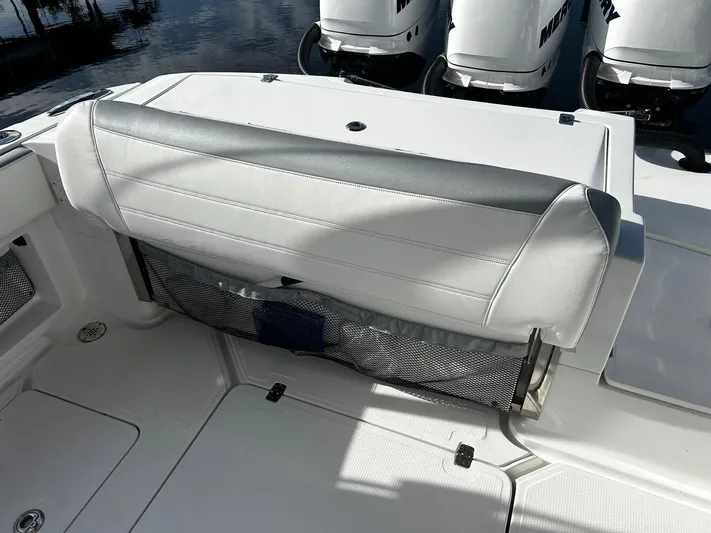  Yacht Photos Pics 2021 Nor-Tech 390 Sport Center Console boat seating and storage area.