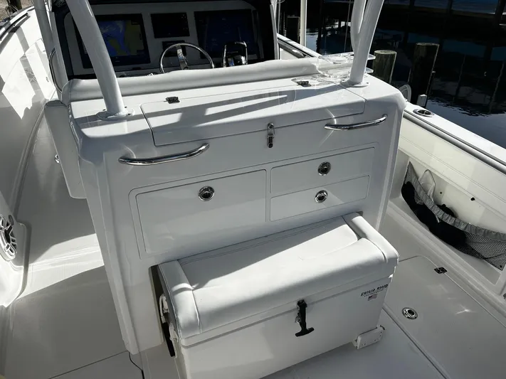  Yacht Photos Pics 2021 Nor-Tech 390 Sport Center Console interior with storage compartments and seating.