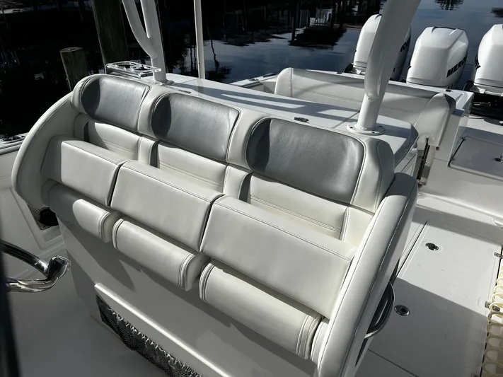  Yacht Photos Pics 2021 Nor-Tech 390 Sport Center Console boat seating and deck area.