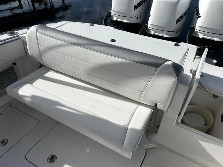  Yacht Photos Pics 2021 Nor-Tech 390 Sport Center Console boat with white and gray seating.
