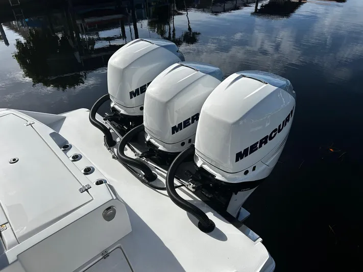  Yacht Photos Pics 2021 Nor-Tech 390 Sport Center Console with triple Mercury outboard engines.
