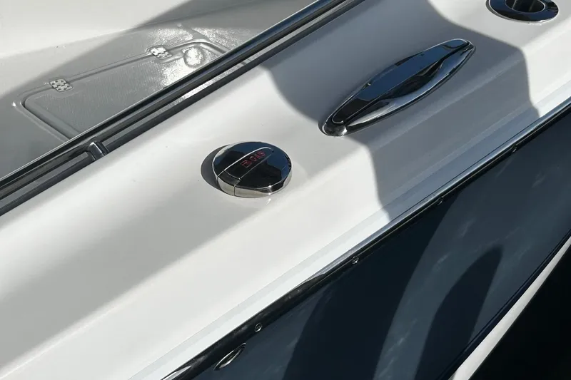  Yacht Photos Pics 2021 Nor-Tech 390 Sport Center Console boat deck with chrome fixtures.