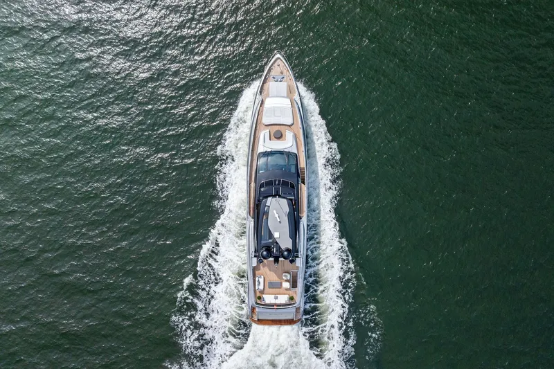 Riva Royale Yacht Photos Pics Aerial view of 2023 Riva 110' Dolcevita yacht cruising on open water.