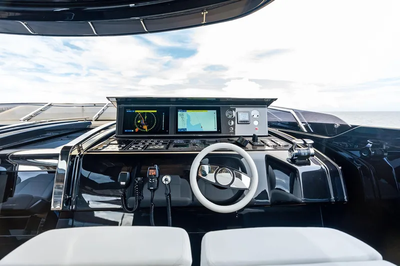 Riva Royale Yacht Photos Pics Cockpit of 2023 Riva 110' Dolcevita yacht with advanced navigation systems.