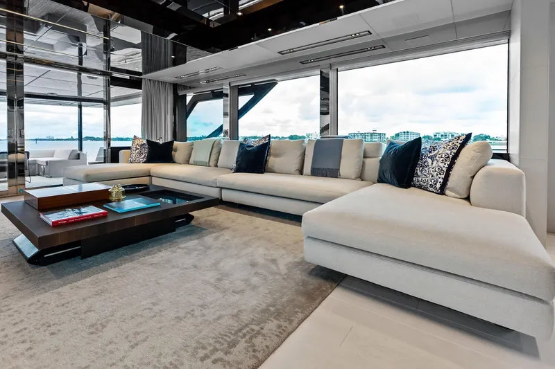 Riva Royale Yacht Photos Pics Luxurious interior of 2023 Riva 110' Dolcevita yacht with elegant seating and panoramic views.