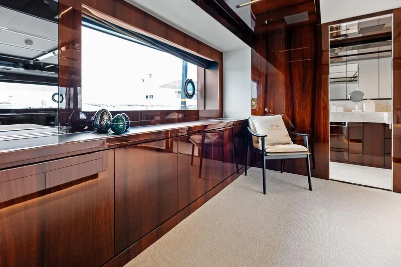 Riva Royale Yacht Photos Pics Luxurious interior of 2023 Riva 110' Dolcevita yacht with elegant wood finishes.