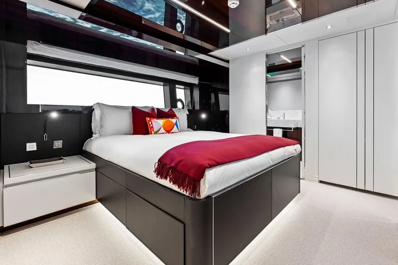 Riva Royale Yacht Photos Pics Luxurious bedroom interior on 2023 Riva 110' Dolcevita yacht with modern design and elegant decor.